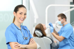 Orthodontic Assistant With Patient