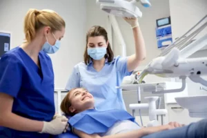 Dental assistant taking x rays