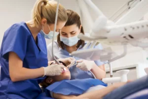 Dental assistant helping with procedure