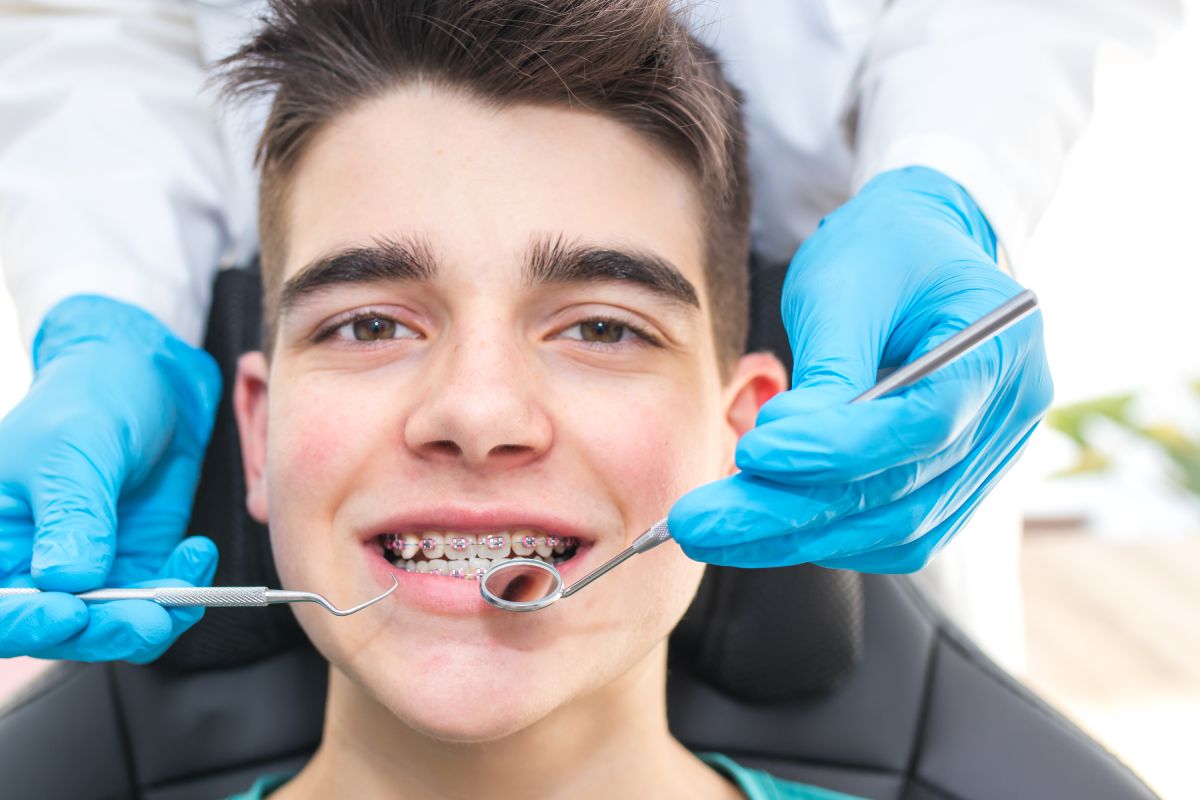 Young man at the orthodontist